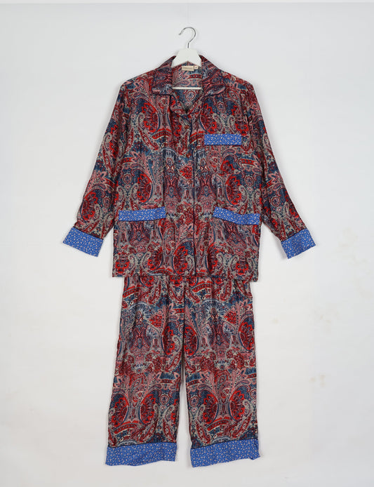 Chic long-sleeve pajama set made from recycled materials, representing eco friendly products, repurposed clothing, and zero waste clothing in green fashion.