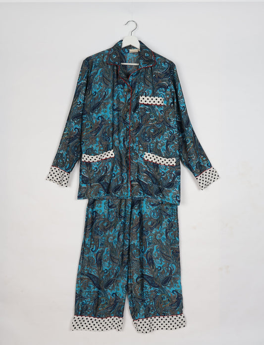 Chic long-sleeve pajama set made from recycled materials, representing eco friendly products, repurposed clothing, and zero waste clothing in green fashion.