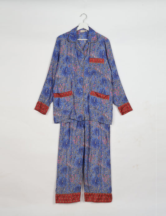 Chic long-sleeve pajama set made from recycled materials, representing eco friendly products, repurposed clothing, and zero waste clothing in green fashion.