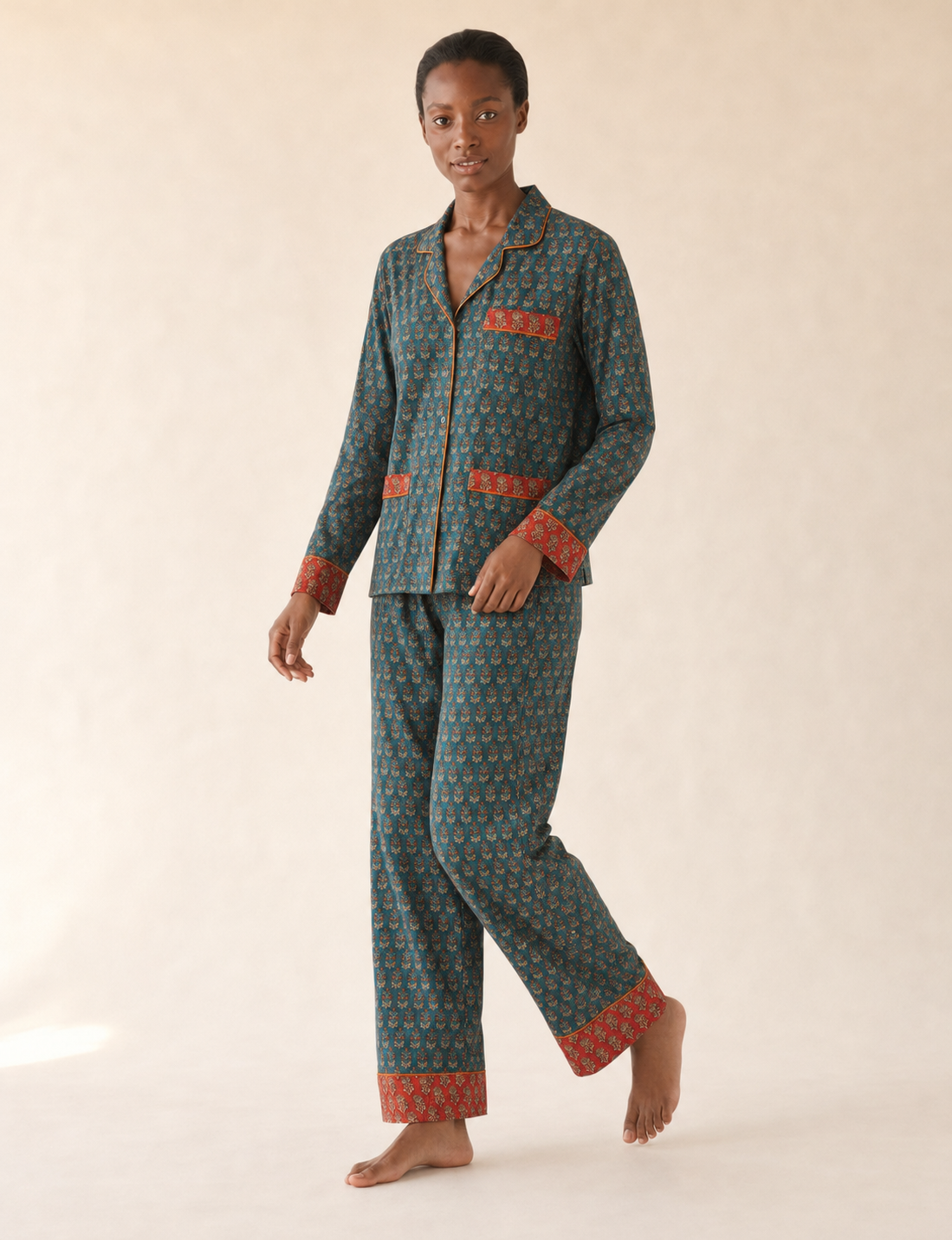 Chic long-sleeve pajama set made from recycled materials, representing eco friendly products, repurposed clothing, and zero waste clothing in green fashion.