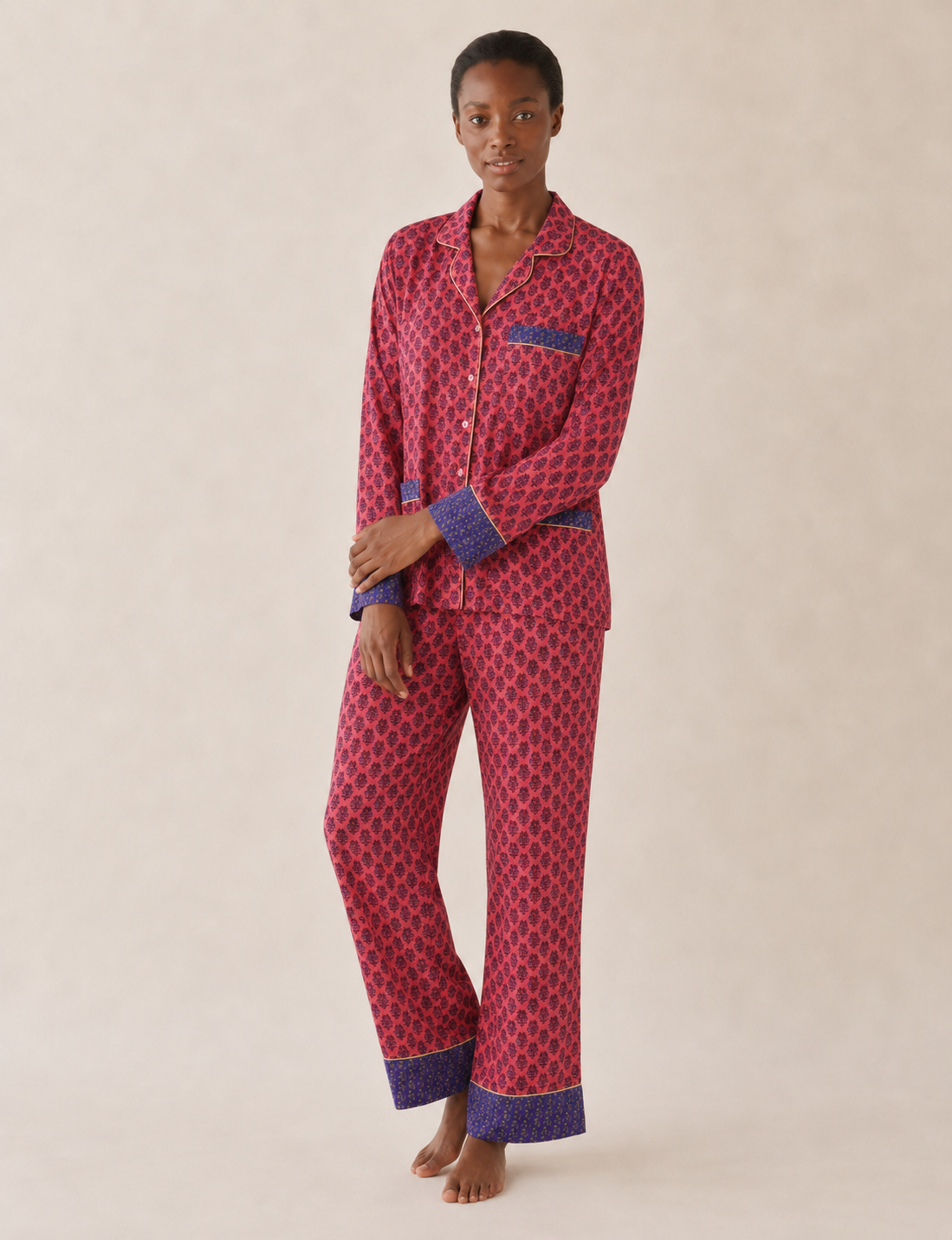 Chic long-sleeve pajama set made from recycled materials, representing eco friendly products, repurposed clothing, and zero waste clothing in green fashion.