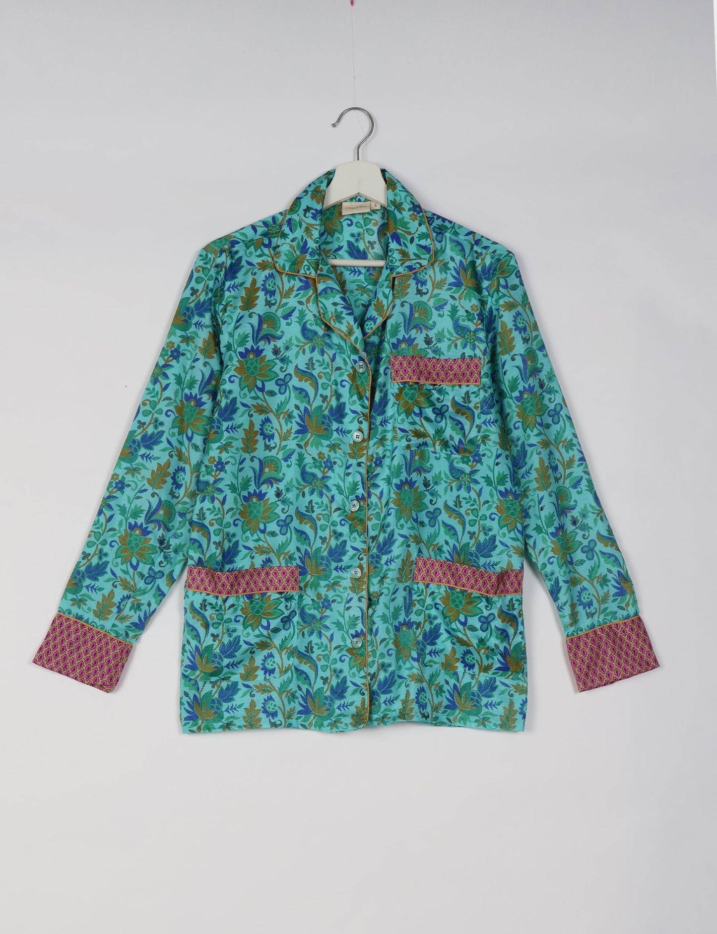 Choose sustainable sleepwear with our PJ SET – perfect for conscious living. From chilling to entertaining, these day-to-night pajamas feature an ethically crafted long-sleeve button-down and elastic-waist pants. Elevate your sleepwear with eco-friendly elegance.