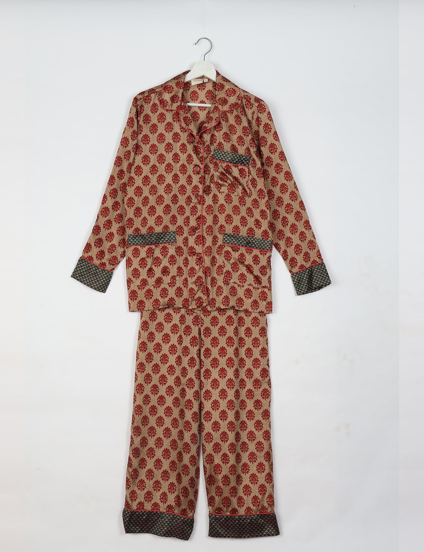 Choose sustainable sleepwear with our PJ SET – perfect for conscious living. From chilling to entertaining, these day-to-night pajamas feature an ethically crafted long-sleeve button-down and elastic-waist pants. Elevate your sleepwear with eco-friendly elegance.