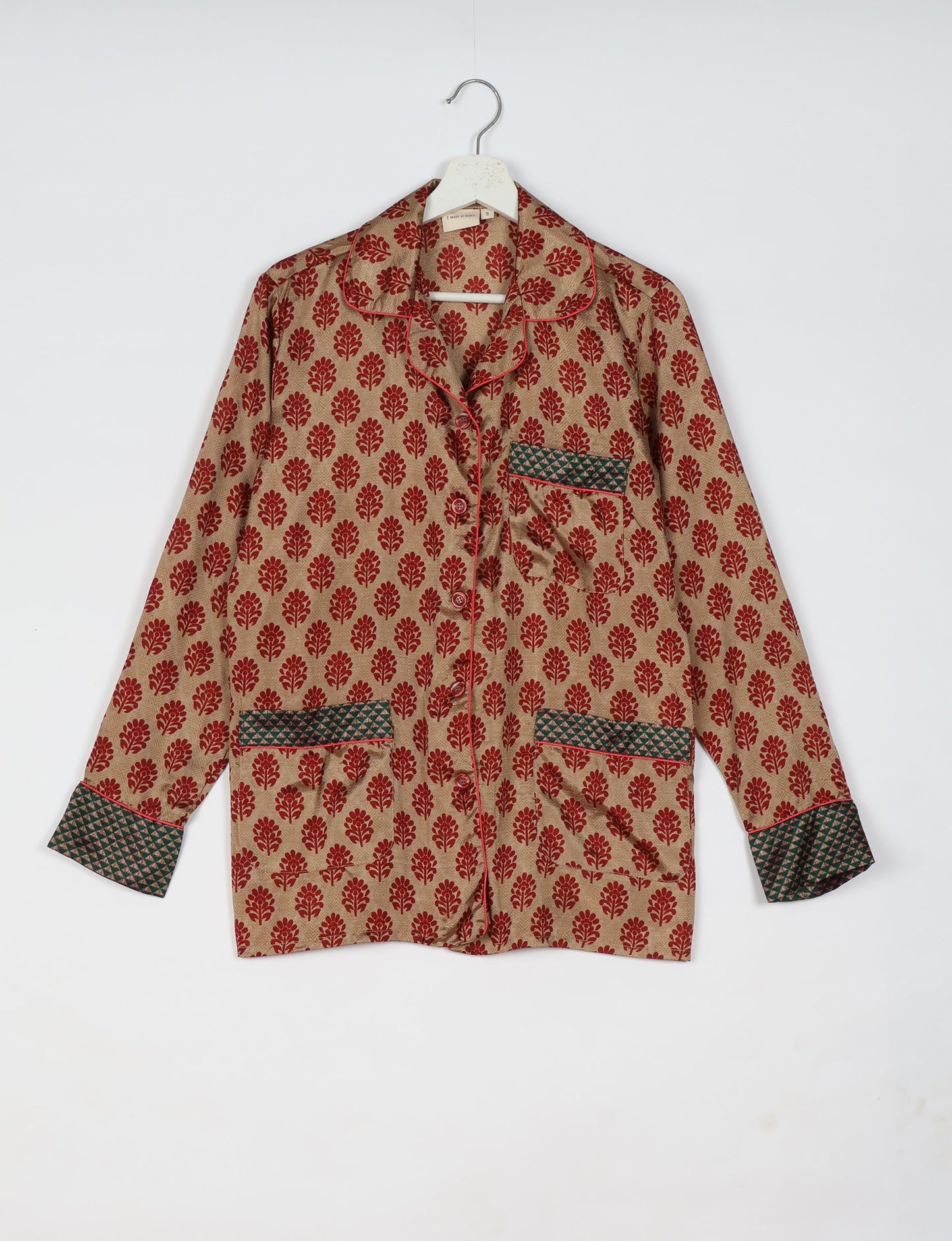 Choose sustainable sleepwear with our PJ SET – perfect for conscious living. From chilling to entertaining, these day-to-night pajamas feature an ethically crafted long-sleeve button-down and elastic-waist pants. Elevate your sleepwear with eco-friendly elegance.