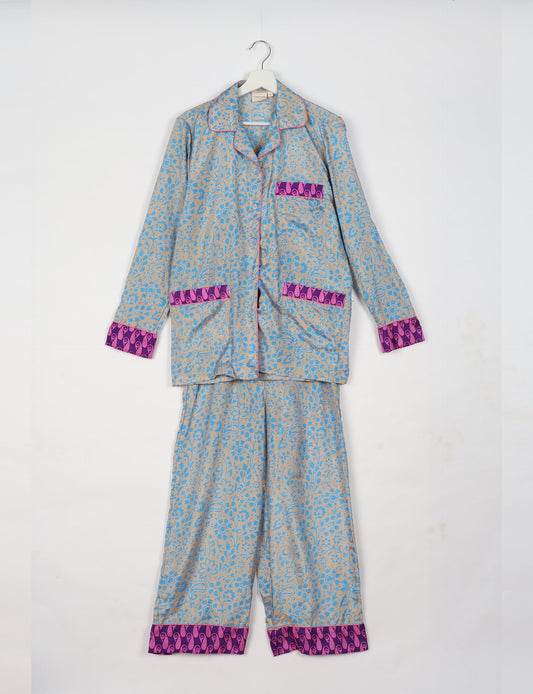 Choose sustainable sleepwear with our PJ SET – perfect for conscious living. From chilling to entertaining, these day-to-night pajamas feature an ethically crafted long-sleeve button-down and elastic-waist pants. Elevate your sleepwear with eco-friendly elegance.