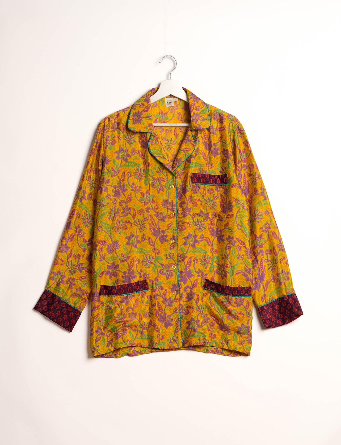 Choose sustainable sleepwear with our PJ SET – perfect for conscious living. From chilling to entertaining, these day-to-night pajamas feature an ethically crafted long-sleeve button-down and elastic-waist pants. Elevate your sleepwear with eco-friendly elegance.