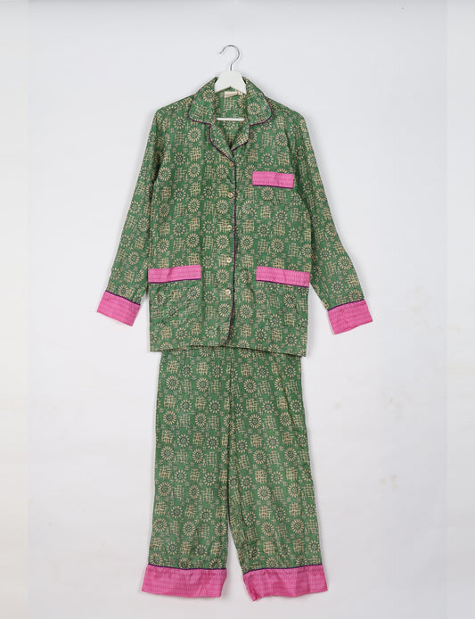 Choose sustainable sleepwear with our PJ SET – perfect for conscious living. From chilling to entertaining, these day-to-night pajamas feature an ethically crafted long-sleeve button-down and elastic-waist pants. Elevate your sleepwear with eco-friendly elegance.