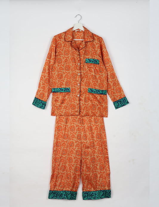 Choose sustainable sleepwear with our PJ SET – perfect for conscious living. From chilling to entertaining, these day-to-night pajamas feature an ethically crafted long-sleeve button-down and elastic-waist pants. Elevate your sleepwear with eco-friendly elegance.