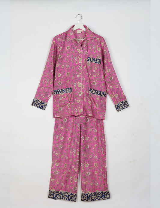 Choose sustainable sleepwear with our PJ SET – perfect for conscious living. From chilling to entertaining, these day-to-night pajamas feature an ethically crafted long-sleeve button-down and elastic-waist pants. Elevate your sleepwear with eco-friendly elegance.