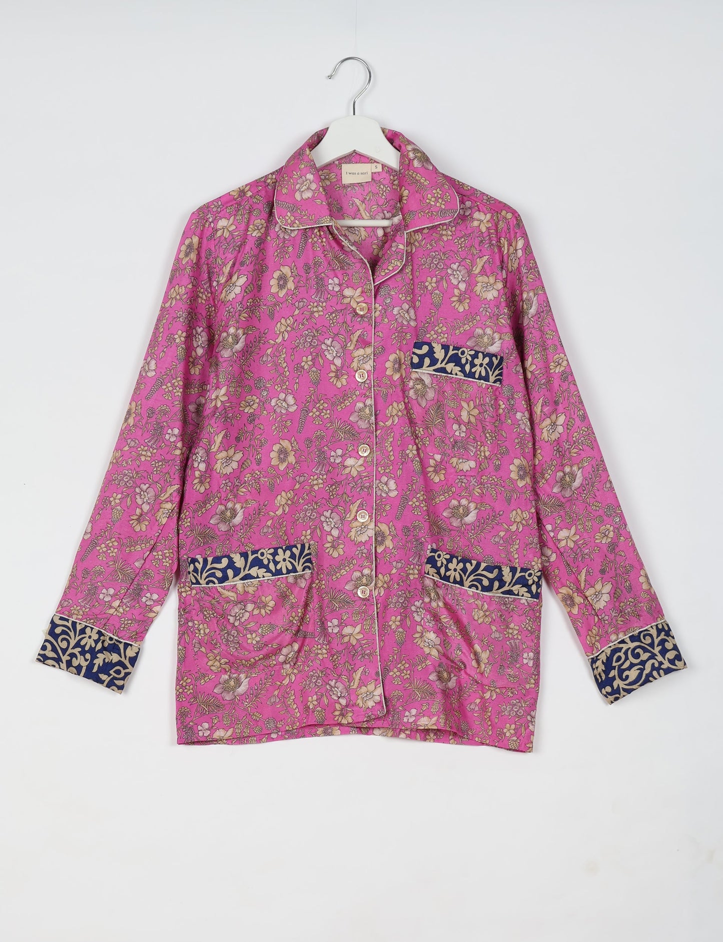 Choose sustainable sleepwear with our PJ SET – perfect for conscious living. From chilling to entertaining, these day-to-night pajamas feature an ethically crafted long-sleeve button-down and elastic-waist pants. Elevate your sleepwear with eco-friendly elegance.