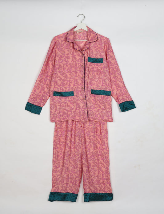 Chic long-sleeve pajama set made from recycled materials, representing eco friendly products, repurposed clothing, and zero waste clothing in green fashion.