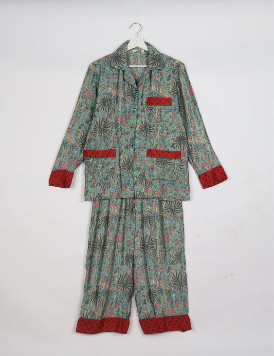 Chic long-sleeve pajama set made from recycled materials, representing eco friendly products, repurposed clothing, and zero waste clothing in green fashion.