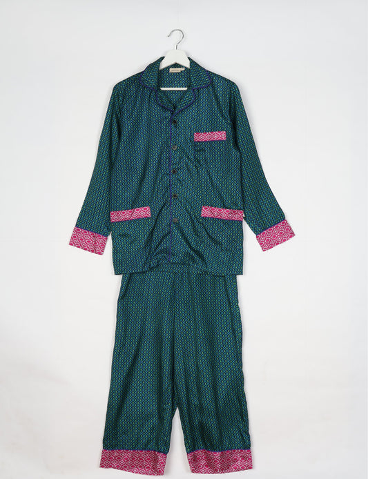 Chic long-sleeve pajama set made from recycled materials, representing eco friendly products, repurposed clothing, and zero waste clothing in green fashion.