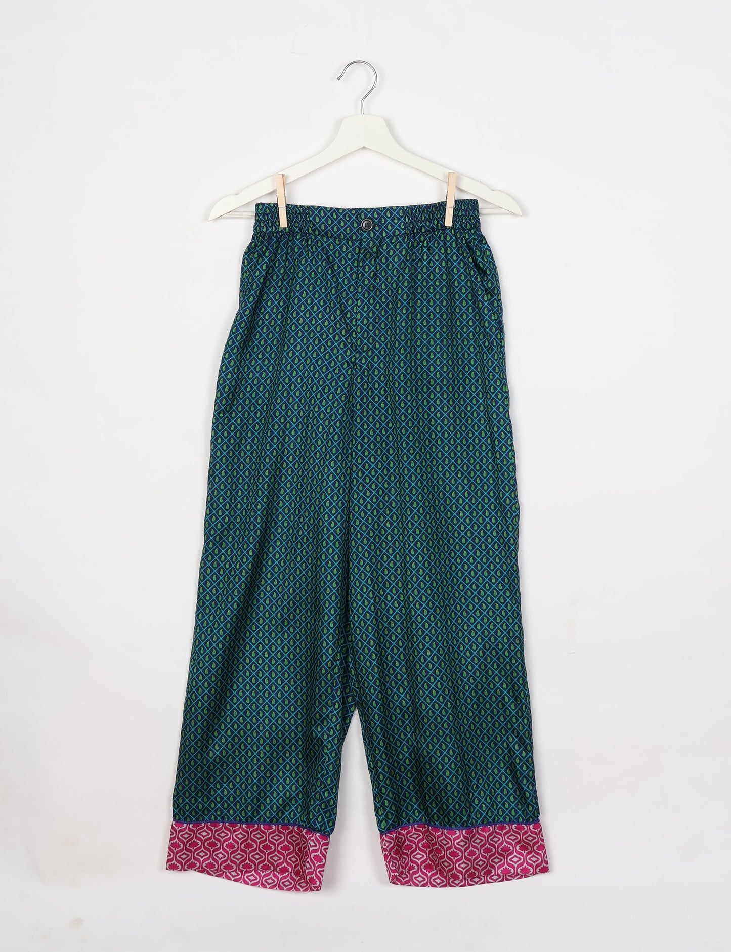 Chic long-sleeve pajama set made from recycled materials, representing eco friendly products, repurposed clothing, and zero waste clothing in green fashion.