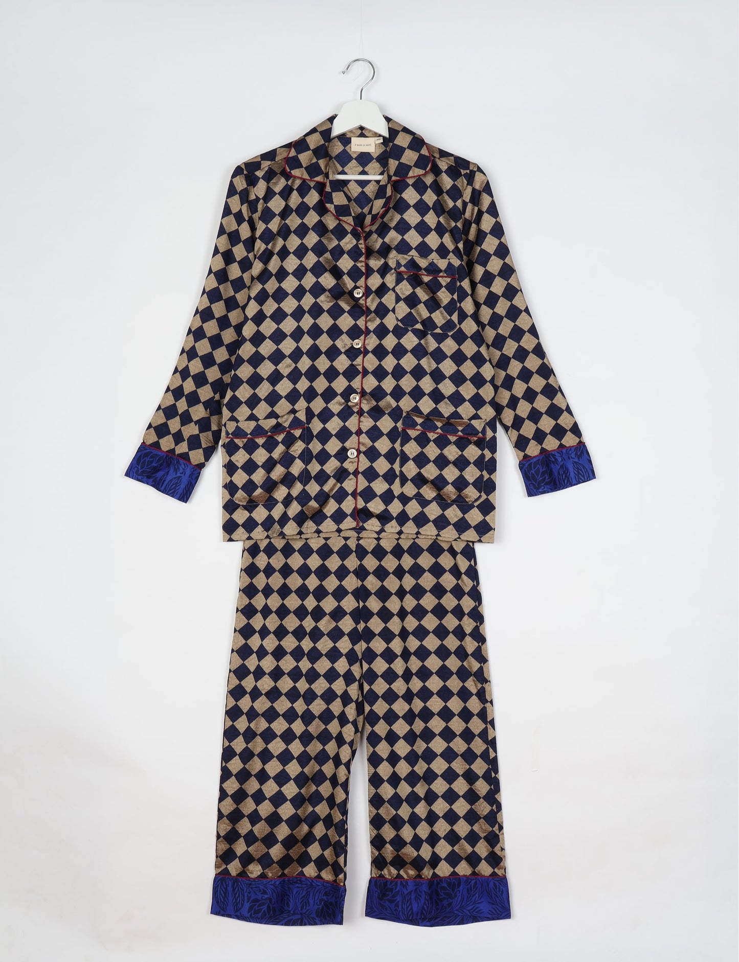 Chic long-sleeve pajama set made from recycled materials, representing eco friendly products, repurposed clothing, and zero waste clothing in green fashion.