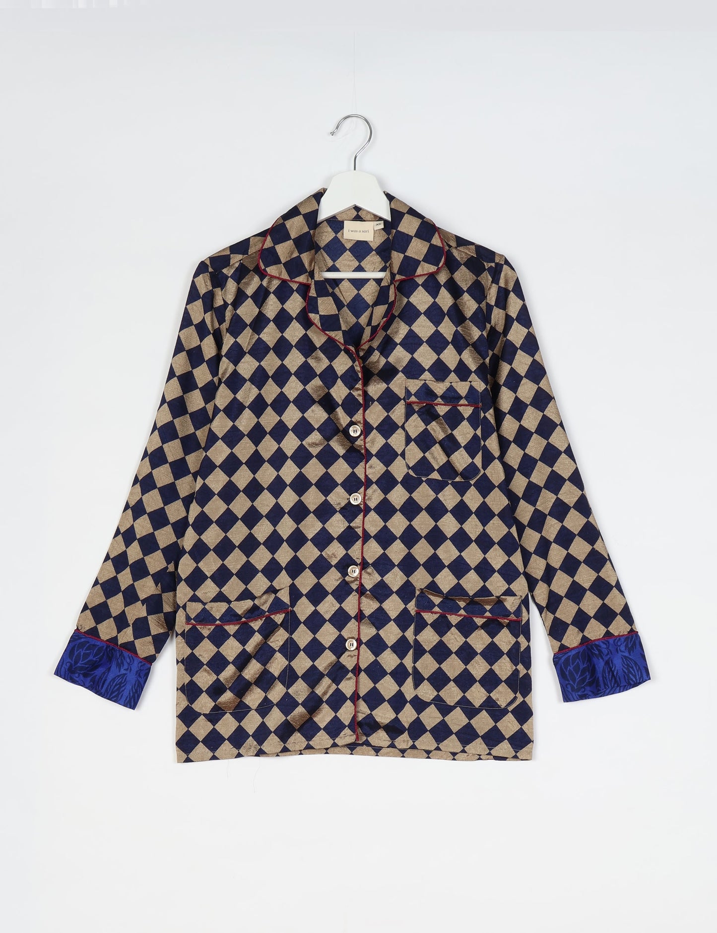 Chic long-sleeve pajama set made from recycled materials, representing eco friendly products, repurposed clothing, and zero waste clothing in green fashion.