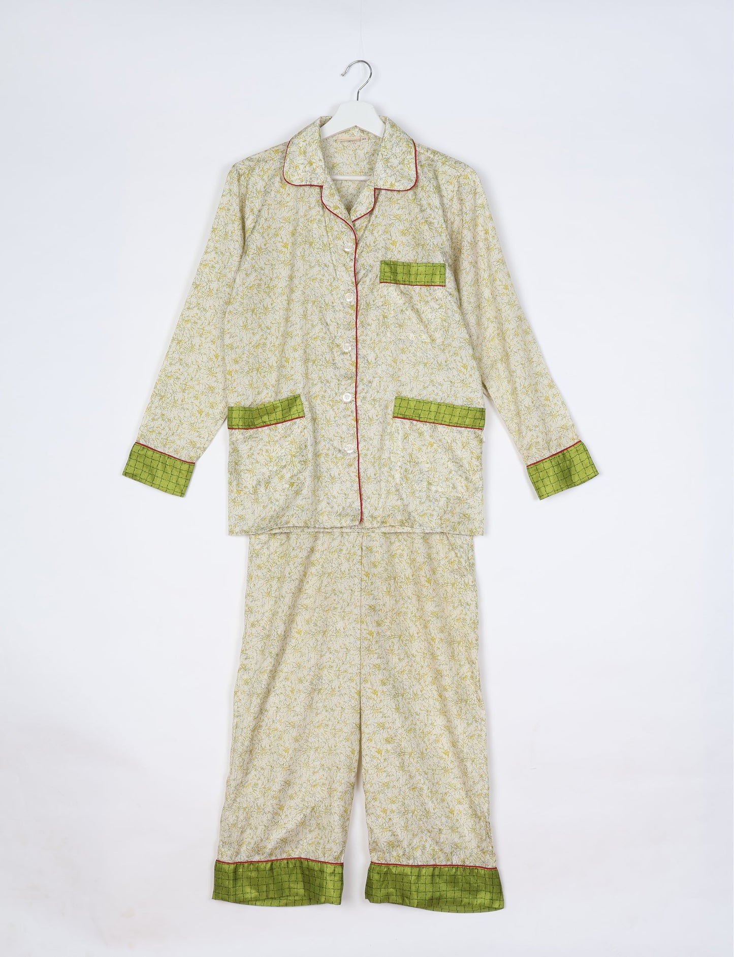 Chic long-sleeve pajama set made from recycled materials, representing eco friendly products, repurposed clothing, and zero waste clothing in green fashion.