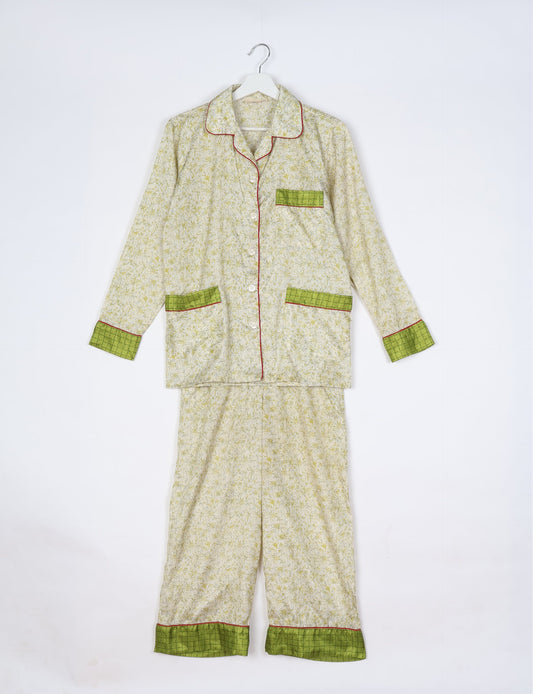 Chic long-sleeve pajama set made from recycled materials, representing eco friendly products, repurposed clothing, and zero waste clothing in green fashion.