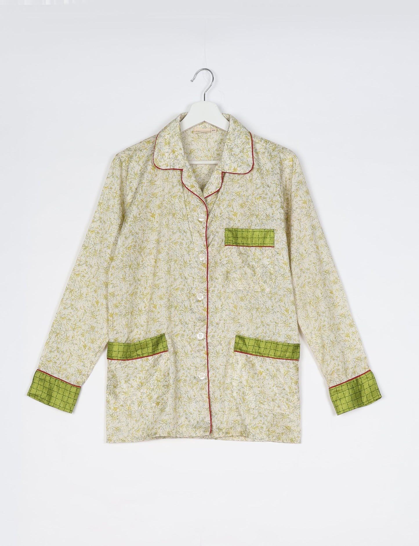 Chic long-sleeve pajama set made from recycled materials, representing eco friendly products, repurposed clothing, and zero waste clothing in green fashion.