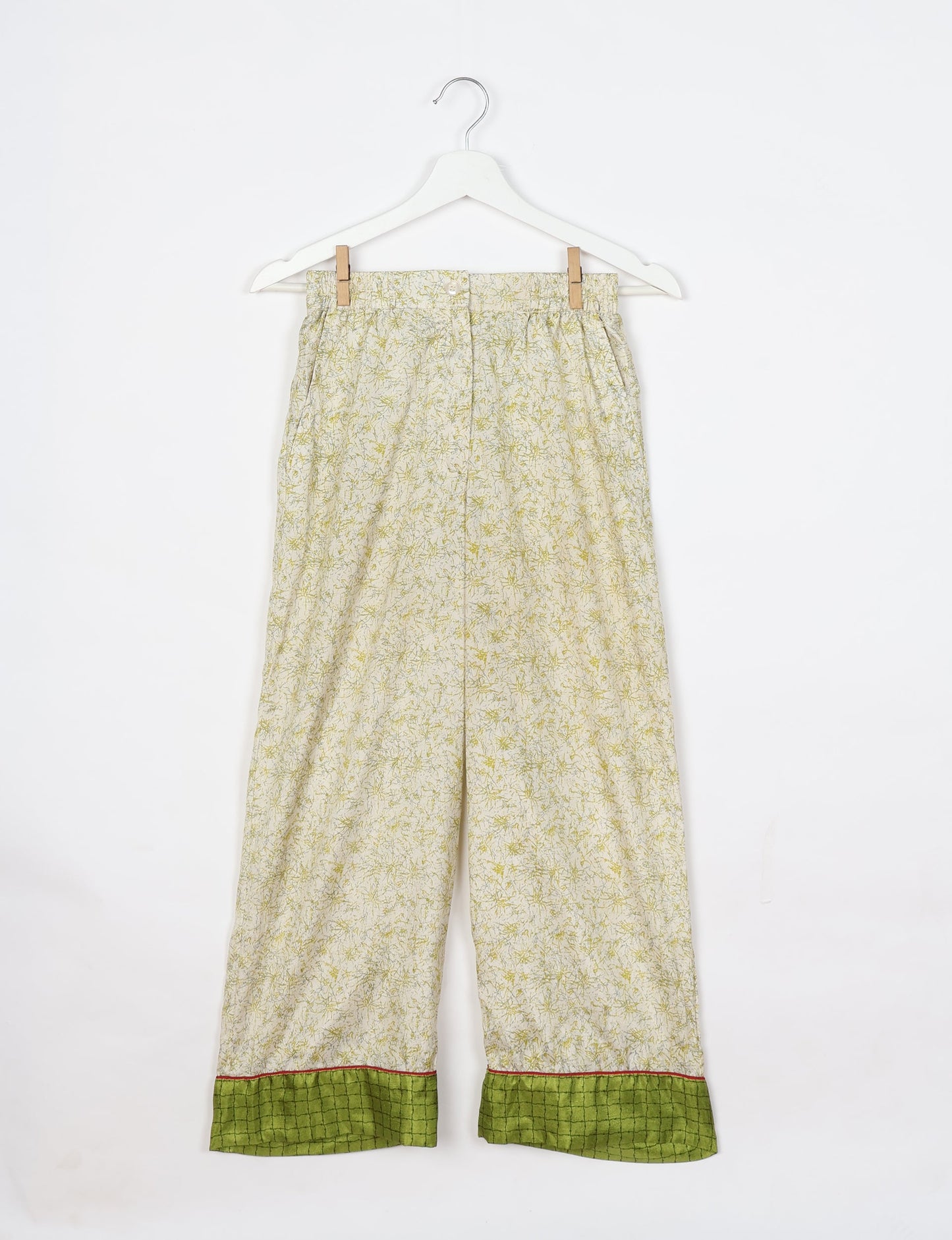 Chic long-sleeve pajama set made from recycled materials, representing eco friendly products, repurposed clothing, and zero waste clothing in green fashion.