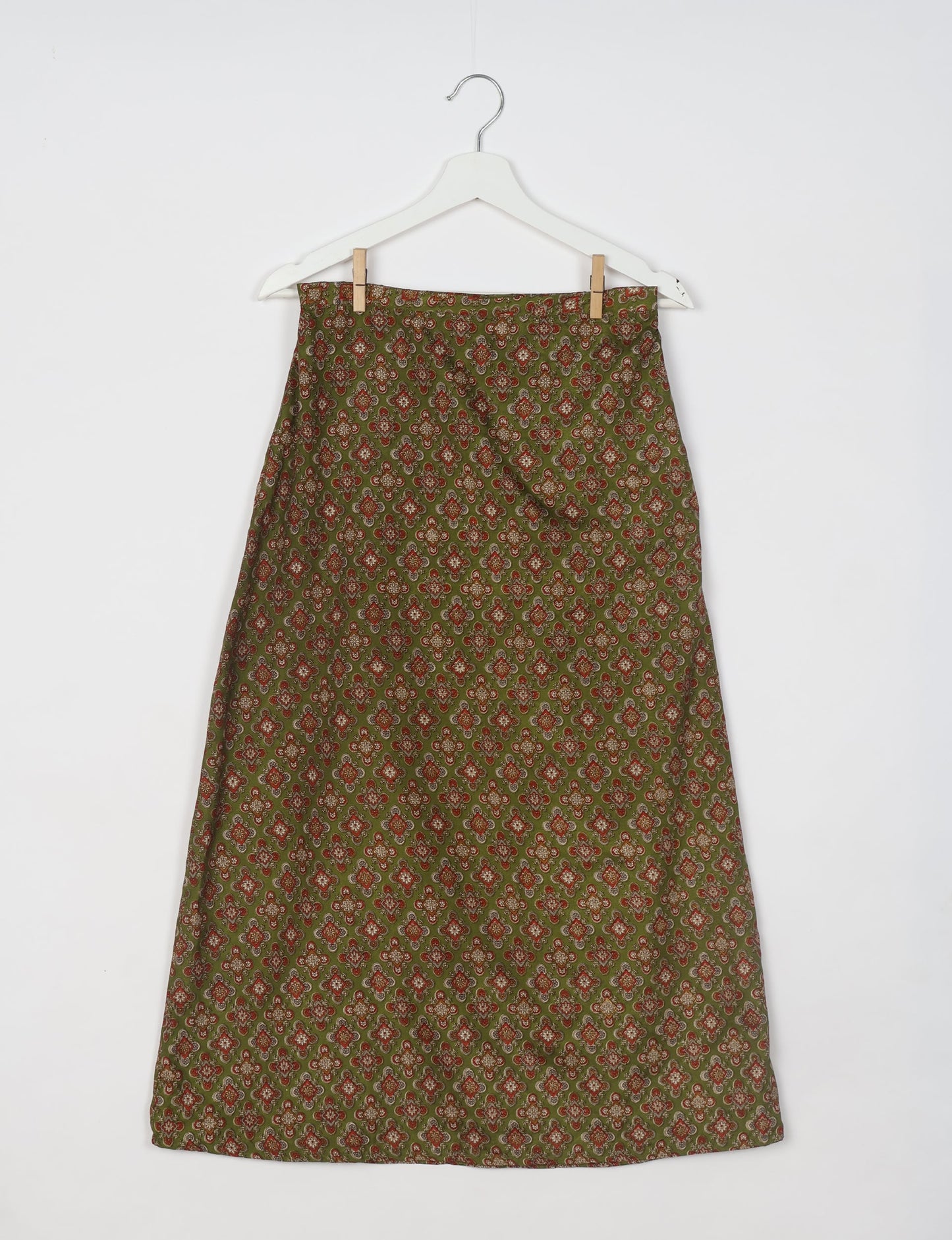 Sustainable A LINE SKIRT, a high-fashion choice for conscious individuals. Fitted at the waist, ankle-length, and ethically crafted for eco-friendly style.