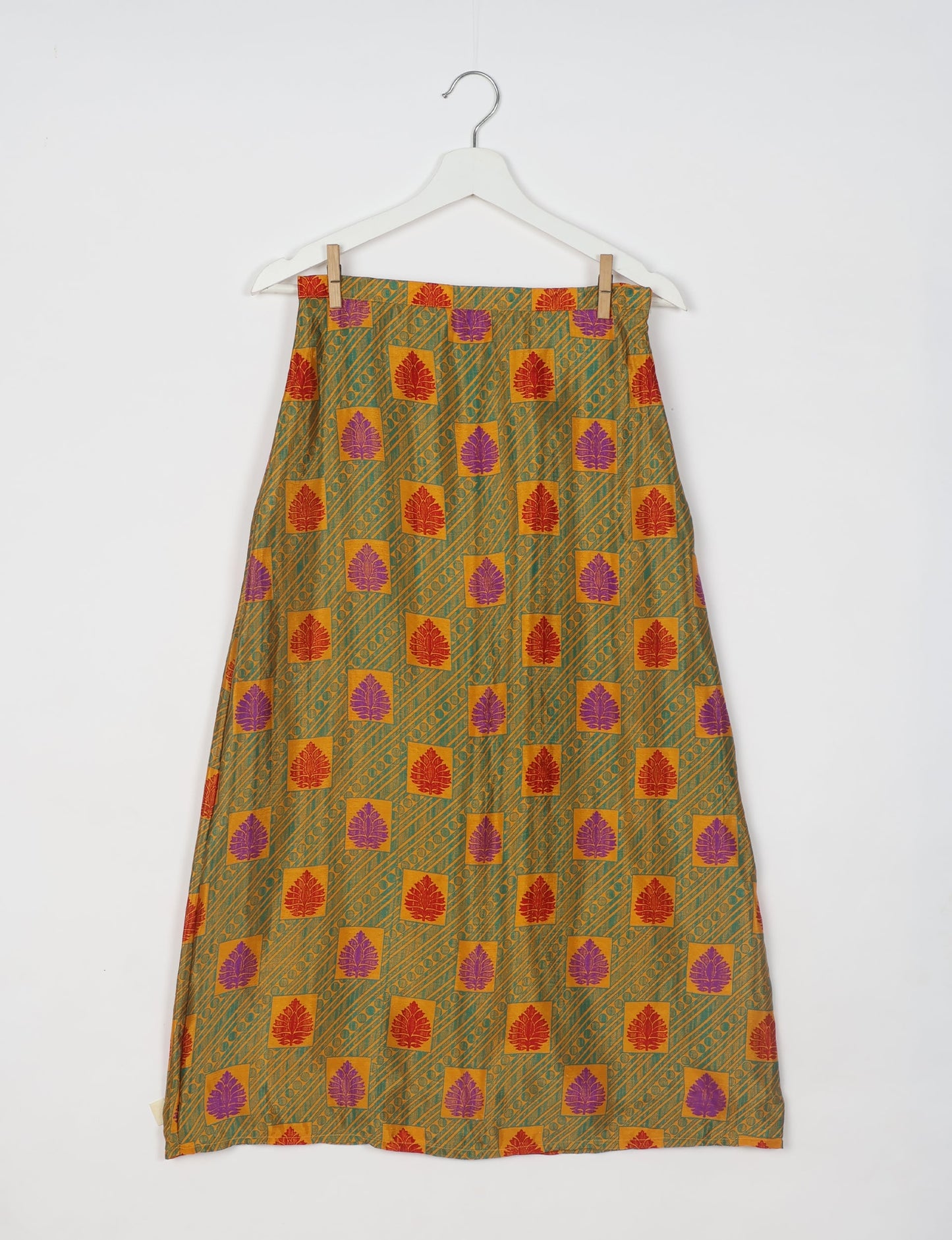 Sustainable A LINE SKIRT, a high-fashion choice for conscious individuals. Fitted at the waist, ankle-length, and ethically crafted for eco-friendly style.