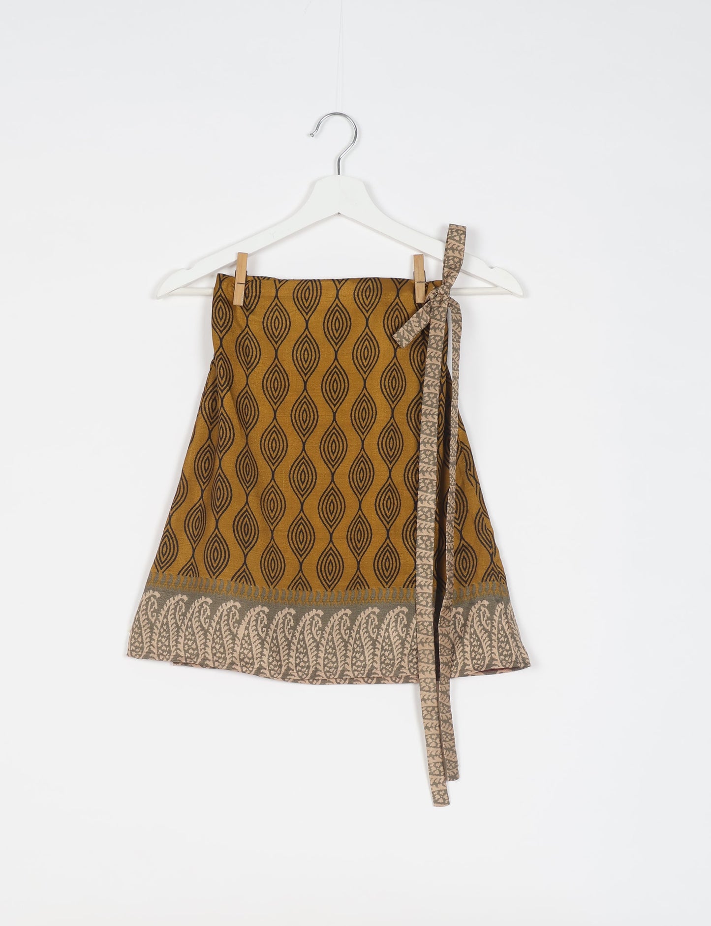 Revolutionize your look with our Wraparound Skirt – short, stylish, and suitable for all waist sizes. Ethical and sustainable, this skirt is a statement in eco-friendly fashion. Embrace conscious clothing with a touch of flair