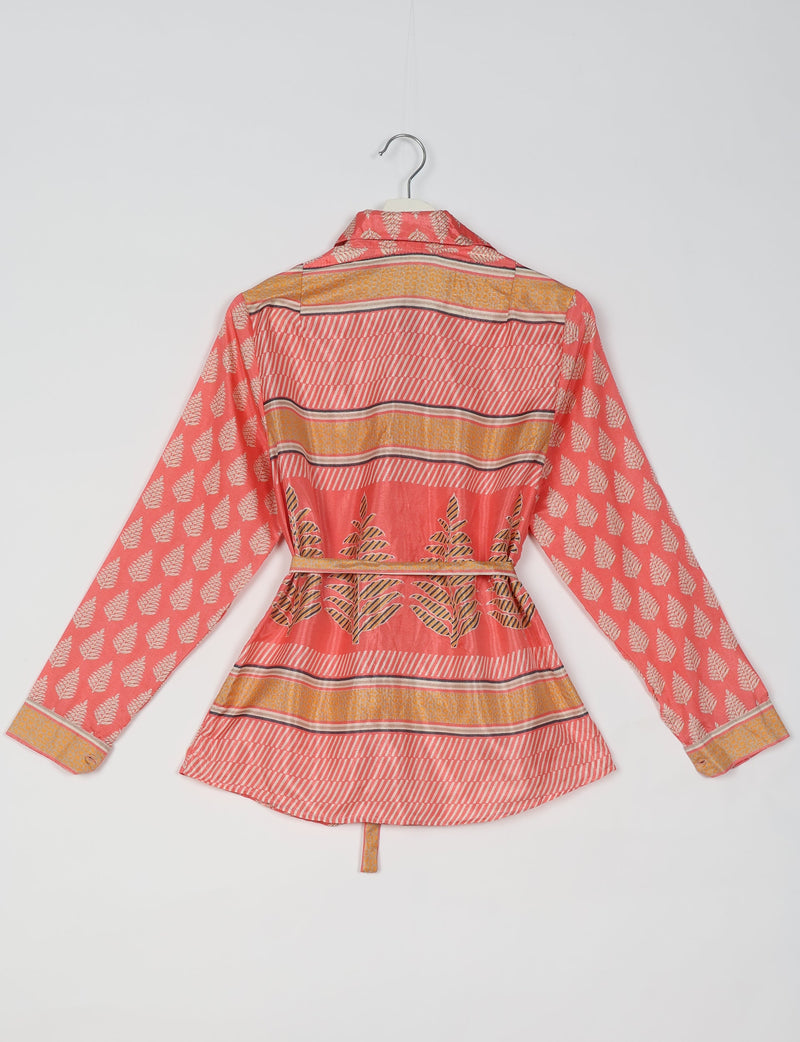 Coral pink ethnic shirt with leaf and stripe patterns, long sleeves, collar, and belt, shown from back on hanger