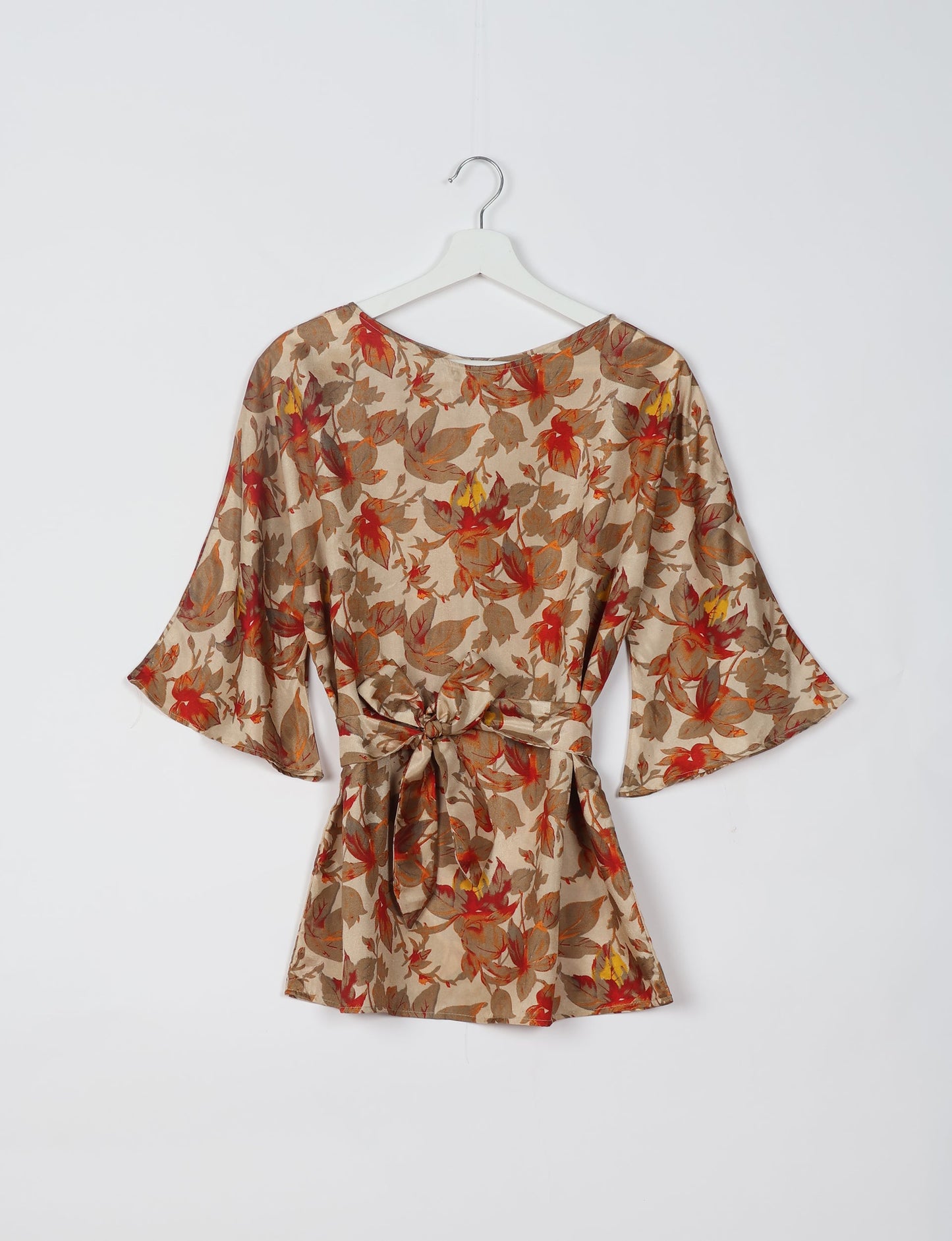 Upcycled women’s Belt Top made from pre-loved saris, showcasing eco friendly cloth, carbon neutral clothing, circular fashion design, environmentally friendly clothing, and second hand clothing elegance.