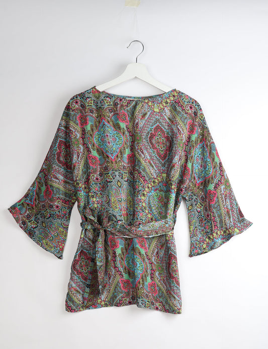 Upcycled women’s Belt Top made from pre-loved saris, showcasing eco friendly cloth, carbon neutral clothing, circular fashion design, environmentally friendly clothing, and second hand clothing elegance.