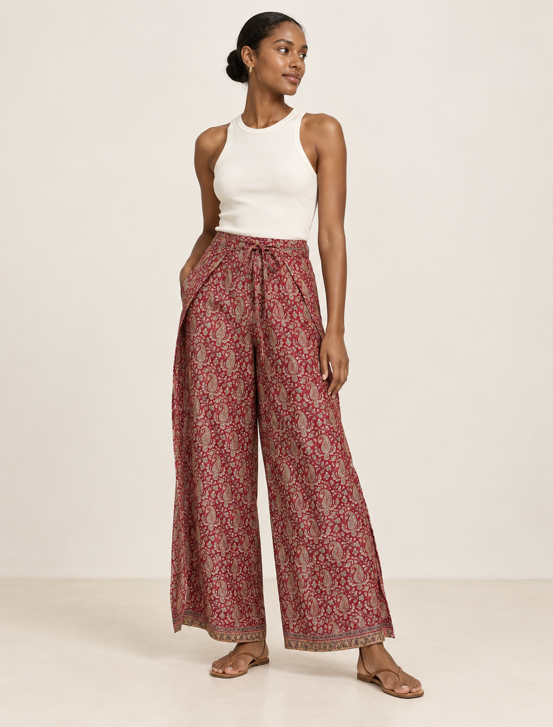 Immerse yourself in the vibrant allure of our PANTA PAREO – a distinctive piece made from handpicked, pre-worn saris, and carefully reworked by local artisans. This pareo is more than just a getaway must-have; it's a sustainable statement. Ideal as a layer over a bikini or a stylish throw, it brings eco-friendly charm to any room in your home. Embrace the colorful elegance of repurposed saris with the PANTA PAREO – an essential addition to your wardrobe for conscious and stylish living.
