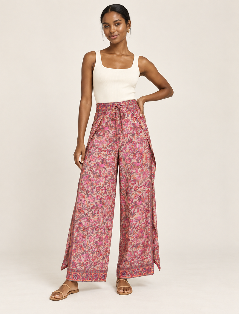 Immerse yourself in the vibrant allure of our PANTA PAREO – a distinctive piece made from handpicked, pre-worn saris, and carefully reworked by local artisans. This pareo is more than just a getaway must-have; it's a sustainable statement. Ideal as a layer over a bikini or a stylish throw, it brings eco-friendly charm to any room in your home. Embrace the colorful elegance of repurposed saris with the PANTA PAREO – an essential addition to your wardrobe for conscious and stylish living.