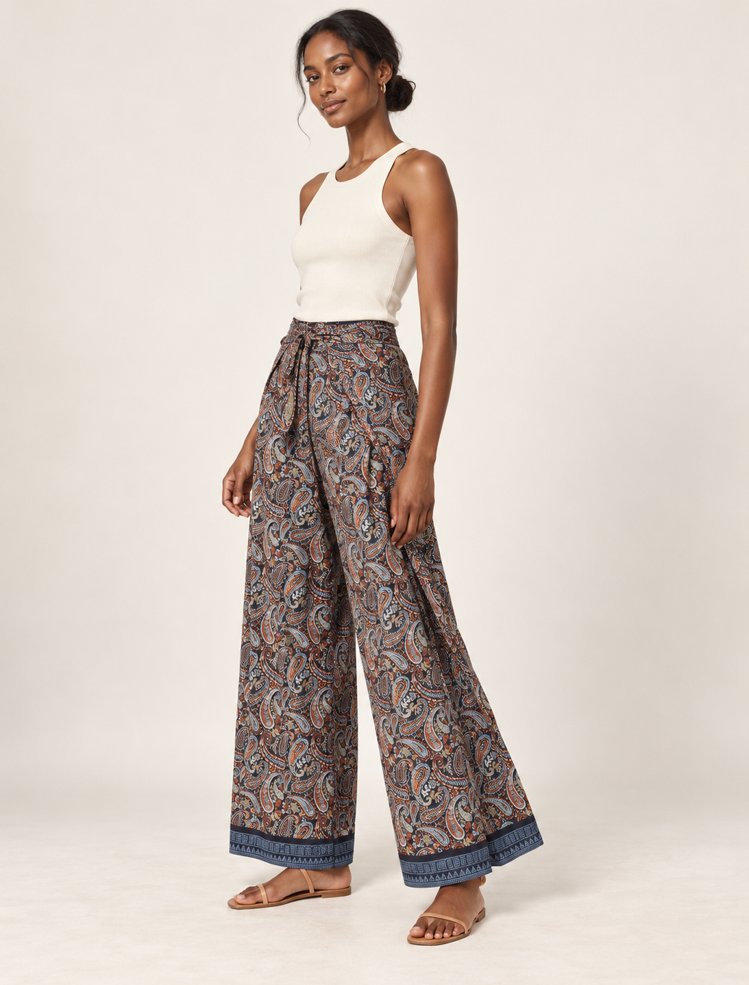 Immerse yourself in the vibrant allure of our PANTA PAREO – a distinctive piece made from handpicked, pre-worn saris, and carefully reworked by local artisans. This pareo is more than just a getaway must-have; it's a sustainable statement. Ideal as a layer over a bikini or a stylish throw, it brings eco-friendly charm to any room in your home. Embrace the colorful elegance of repurposed saris with the PANTA PAREO – an essential addition to your wardrobe for conscious and stylish living.