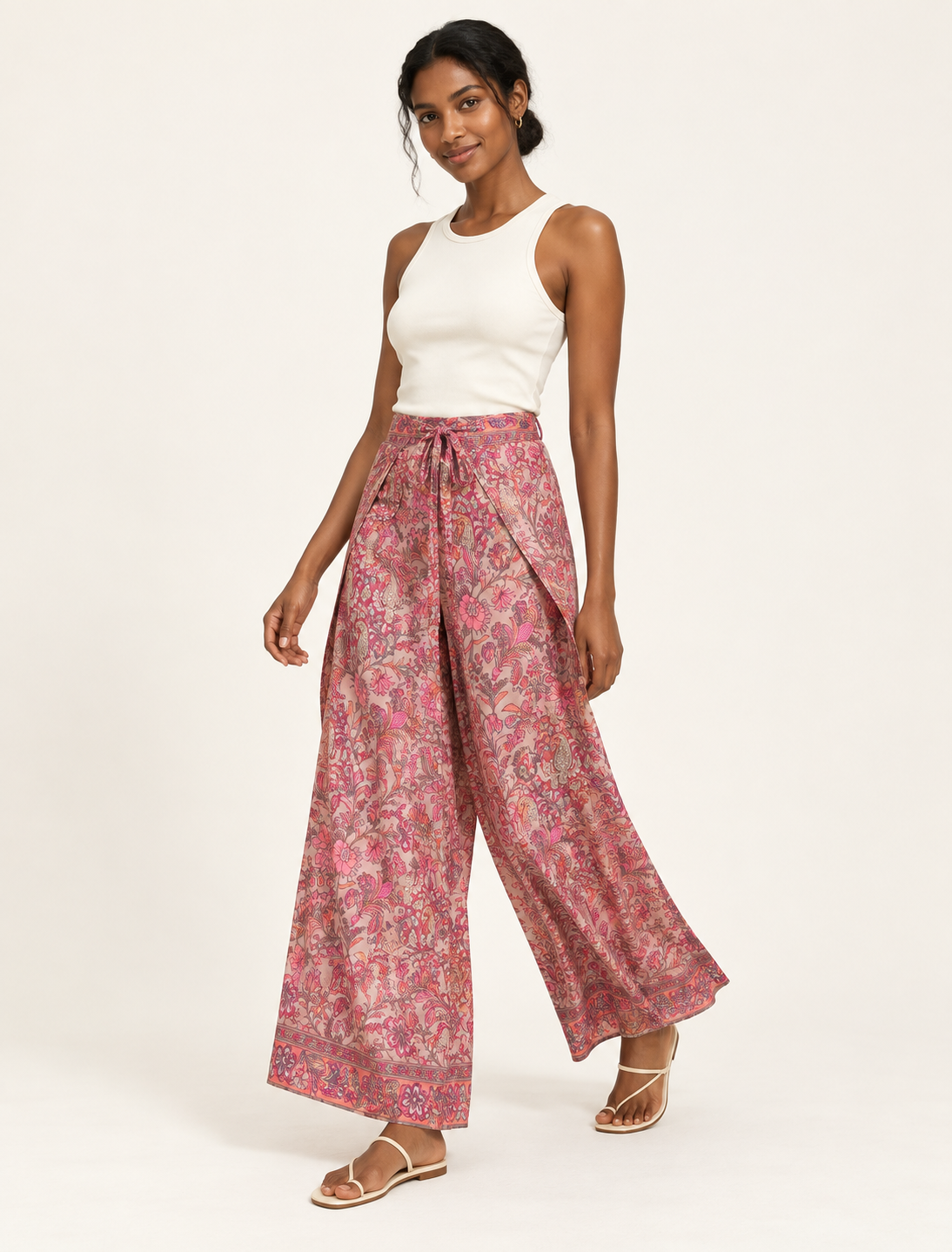 Immerse yourself in the vibrant allure of our PANTA PAREO – a distinctive piece made from handpicked, pre-worn saris, and carefully reworked by local artisans. This pareo is more than just a getaway must-have; it's a sustainable statement. Ideal as a layer over a bikini or a stylish throw, it brings eco-friendly charm to any room in your home. Embrace the colorful elegance of repurposed saris with the PANTA PAREO – an essential addition to your wardrobe for conscious and stylish living.