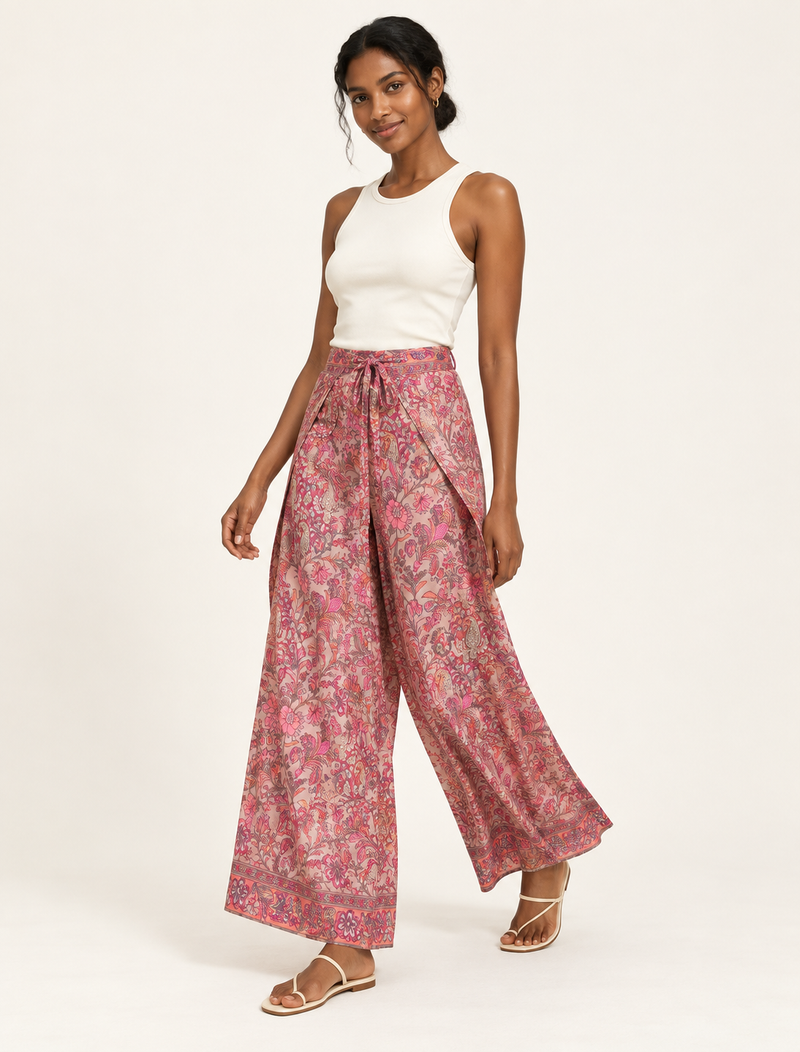 Immerse yourself in the vibrant allure of our PANTA PAREO – a distinctive piece made from handpicked, pre-worn saris, and carefully reworked by local artisans. This pareo is more than just a getaway must-have; it's a sustainable statement. Ideal as a layer over a bikini or a stylish throw, it brings eco-friendly charm to any room in your home. Embrace the colorful elegance of repurposed saris with the PANTA PAREO – an essential addition to your wardrobe for conscious and stylish living.