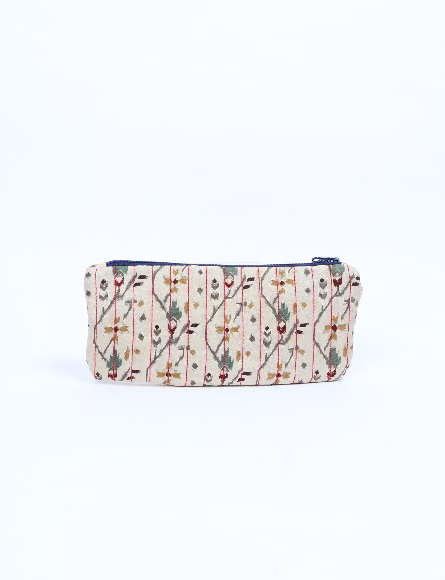 Quilted pencil pouch with blue zipper, beige fabric featuring red, green, and brown Indian ethnic pattern, front view