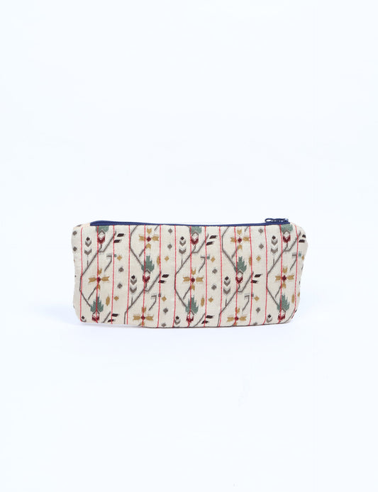 Quilted pencil pouch made from recycled clothing and repurposed textiles, promoting eco friendly fashion and circular fashion ideals. A durable, stylish storage option inspired by recycled sari products, upcycled women’s clothing, and earth friendly fashion practices.