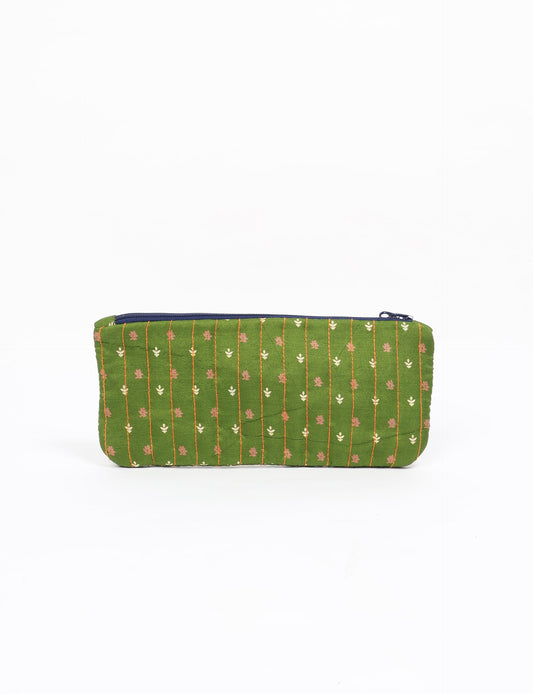 Quilted pencil pouch made from recycled clothing and repurposed textiles, promoting eco friendly fashion and circular fashion ideals. A durable, stylish storage option inspired by recycled sari products, upcycled women’s clothing, and earth friendly fashion practices.