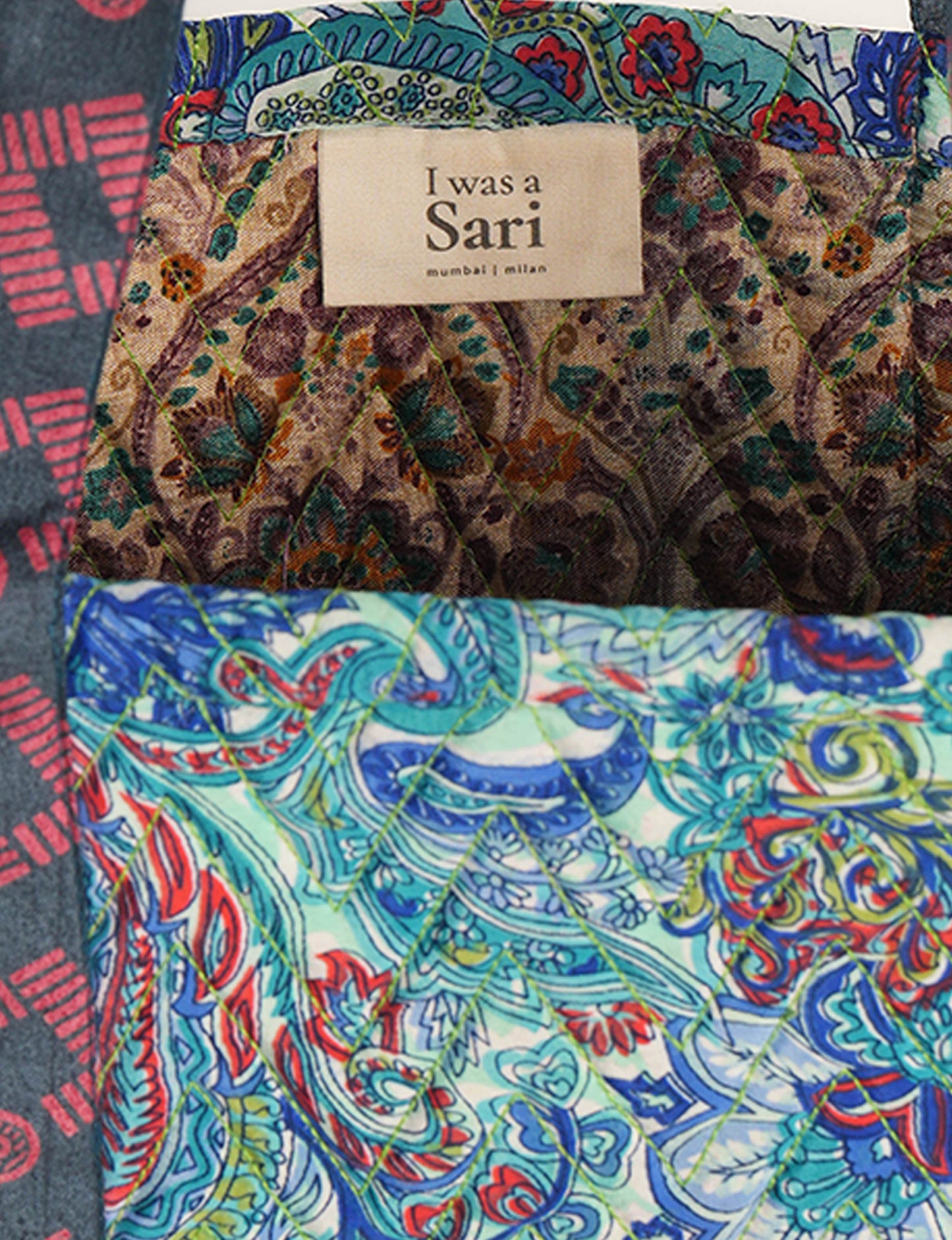 Elevate your style with our Quilted Tote Bag, a perfect fusion of fashion and sustainability. Made from vibrant upcycled saris, the newly quilted design adds strength and softness. With double fabric contrast straps and a unique sari lining, it's a statement of ethical elegance.