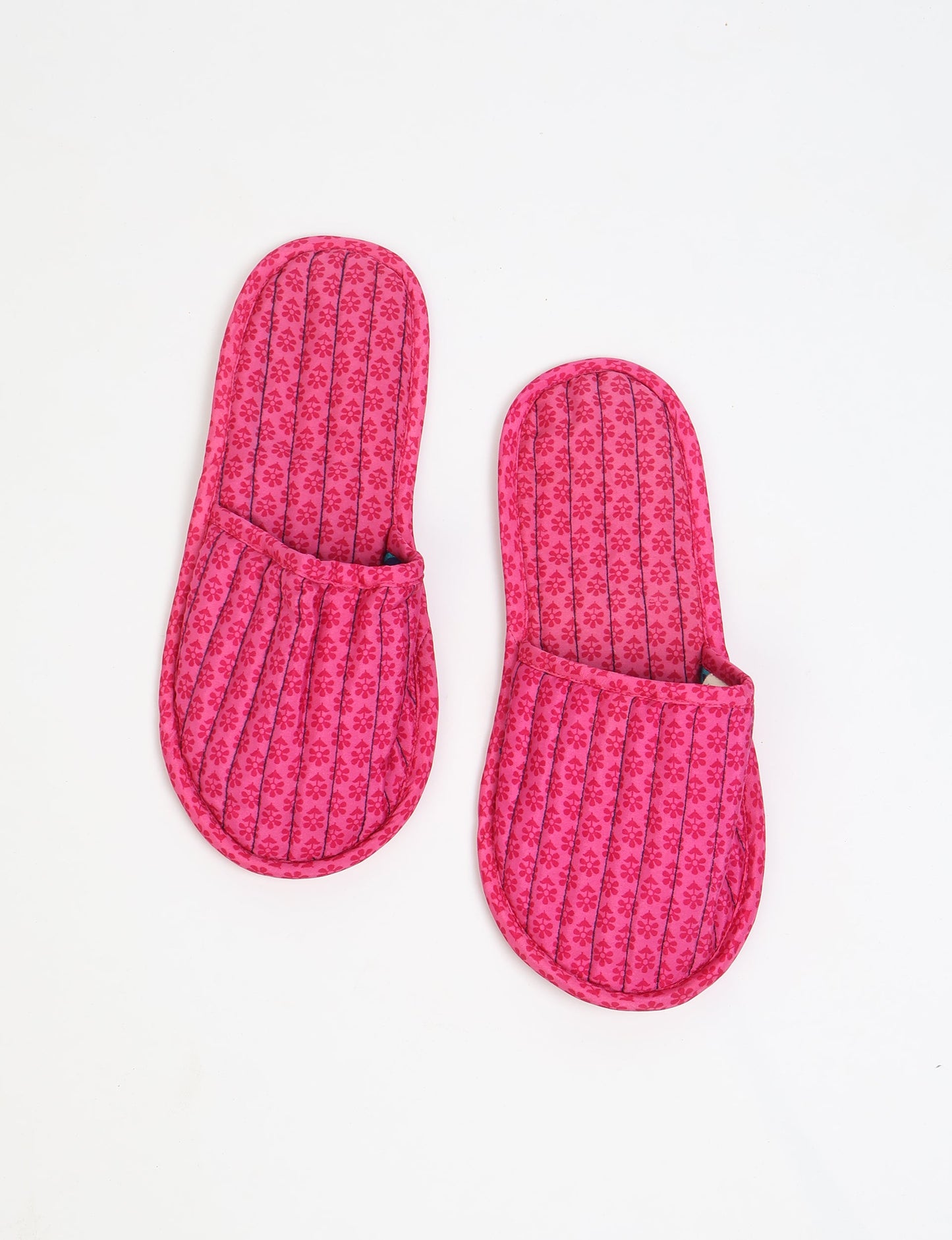 Elevate your downtime with our Quilted Slippers. Ethical, sustainable, and crafted by female artisans in Mumbai, these slippers offer cushioned comfort with a touch of chic style. Warm on the inside, fashionable on the outside, step into sustainable luxury.