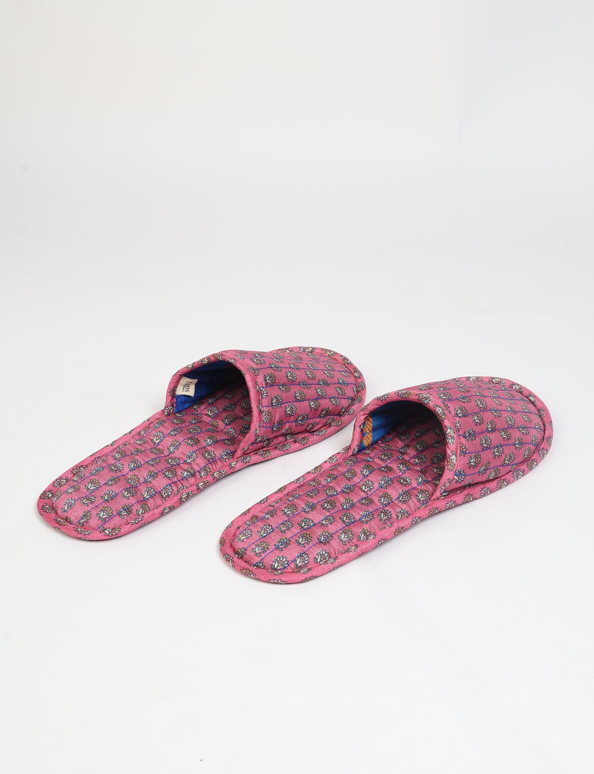 Elevate your downtime with our Quilted Slippers. Ethical, sustainable, and crafted by female artisans in Mumbai, these slippers offer cushioned comfort with a touch of chic style. Warm on the inside, fashionable on the outside, step into sustainable luxury.