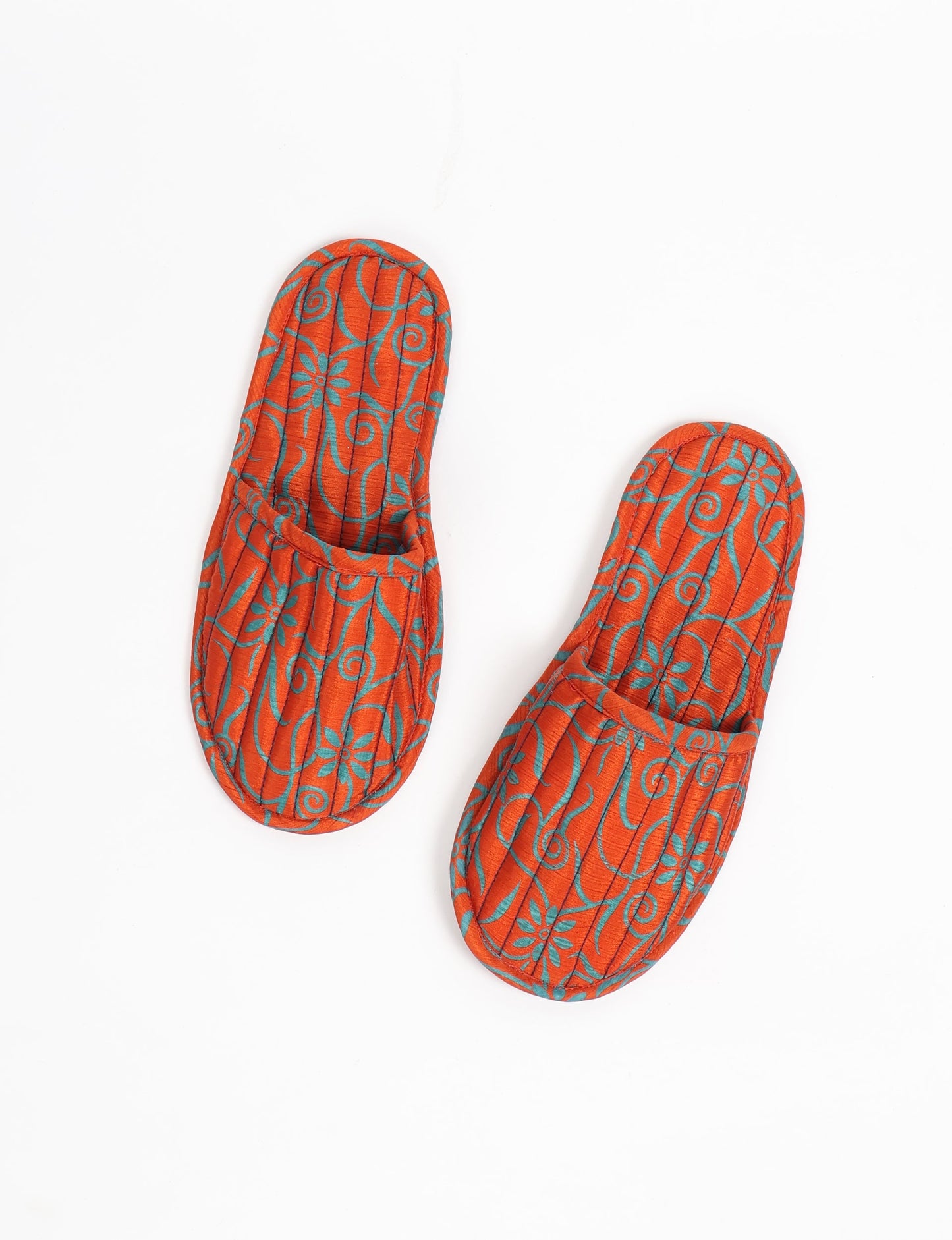 Elevate your downtime with our Quilted Slippers. Ethical, sustainable, and crafted by female artisans in Mumbai, these slippers offer cushioned comfort with a touch of chic style. Warm on the inside, fashionable on the outside, step into sustainable luxury.