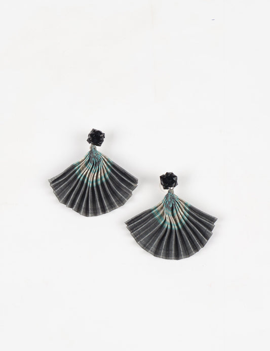 Elevate your style sustainably with our PLEATED EARRINGS – a harmonious blend of ethical fashion and eco-conscious design. Fashioned using innovative heat setting techniques on pre-loved Indian saris, these accessories showcase a commitment to slow fashion and upcycled fashion. Enjoy planet-friendly charm with hypoallergy tested metal hooks, nickel, and lead-free for a skin-friendly touch.