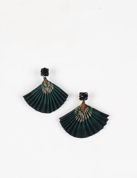 Elevate your style sustainably with our PLEATED EARRINGS – a harmonious blend of ethical fashion and eco-conscious design. Fashioned using innovative heat setting techniques on pre-loved Indian saris, these accessories showcase a commitment to slow fashion and upcycled fashion. Enjoy planet-friendly charm with hypoallergy tested metal hooks, nickel, and lead-free for a skin-friendly touch.