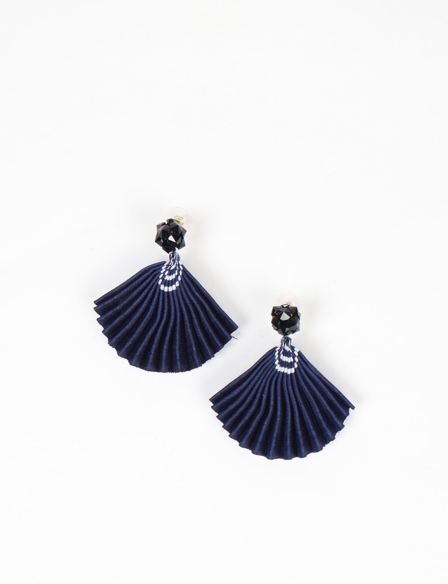 Elevate your style sustainably with our PLEATED EARRINGS – a harmonious blend of ethical fashion and eco-conscious design. Fashioned using innovative heat setting techniques on pre-loved Indian saris, these accessories showcase a commitment to slow fashion and upcycled fashion. Enjoy planet-friendly charm with hypoallergy tested metal hooks, nickel, and lead-free for a skin-friendly touch.