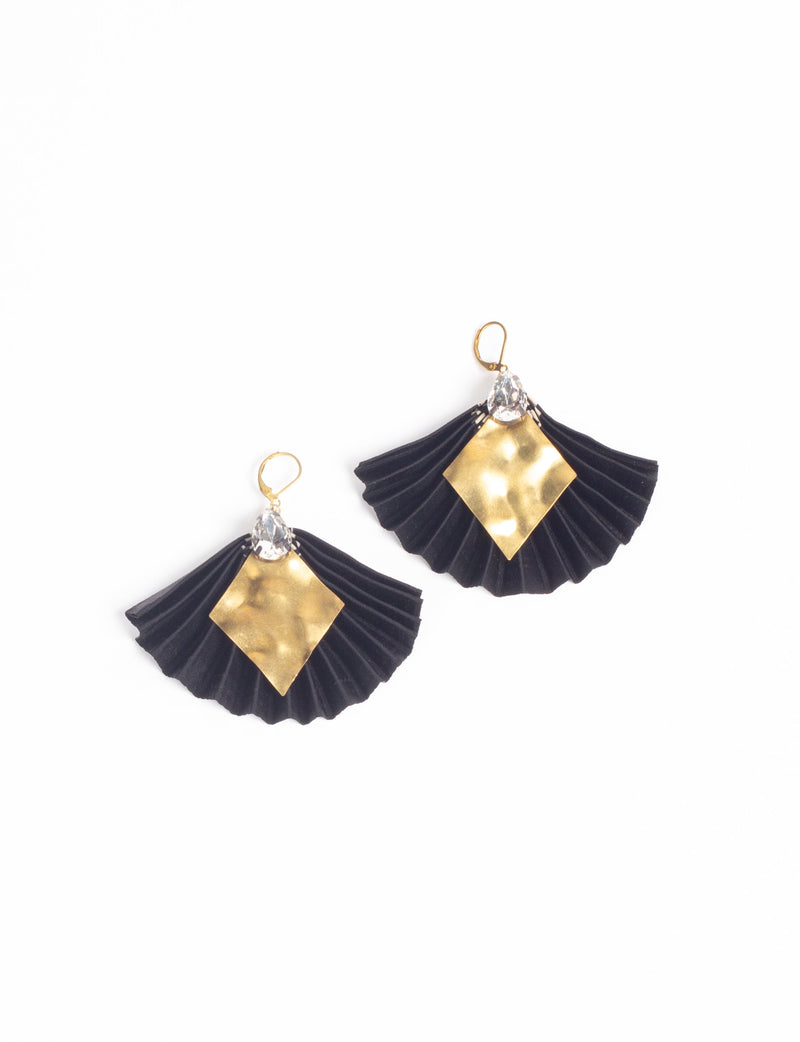 Black pleated fan-shaped earrings with hammered gold diamond accents and clear teardrop crystals, shown flat on white background