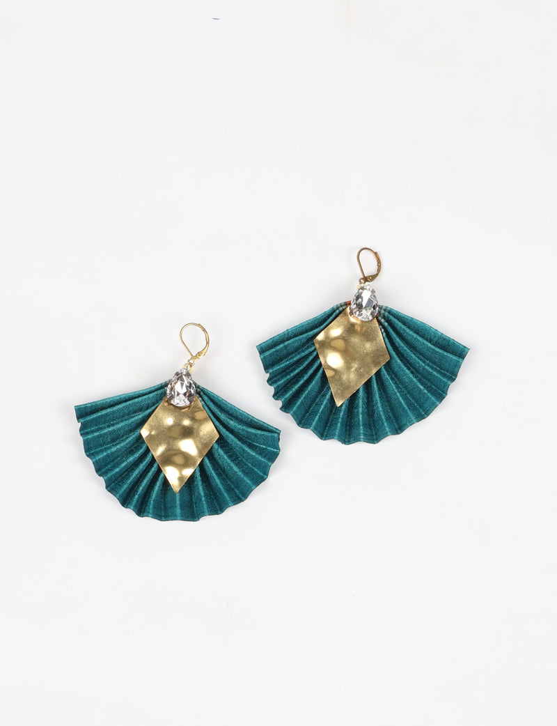 Green pleated fabric earrings with hammered gold diamond-shaped metal and clear teardrop crystals, shown flat on white background