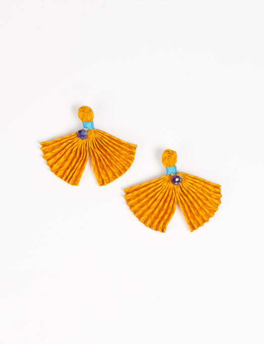 Adorn yourself sustainably with our PLEATED EARRINGS – fan-shaped wonders with a top knot and a tiny stone. Meticulously hand-pleated from Indian saris, these earrings reflect ethical clothing, green fashion, and slow fashion. Fastened with hypoallergy tested metal hooks, nickel, and lead-free, making them a conscious and stylish accessory.