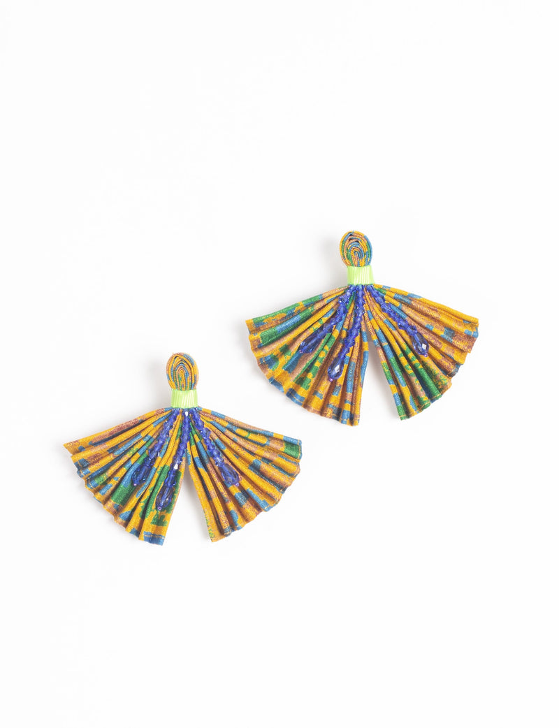 Yellow pleated fabric earrings with abstract blue and green patterns and blue bead embellishments, shown flat on white background