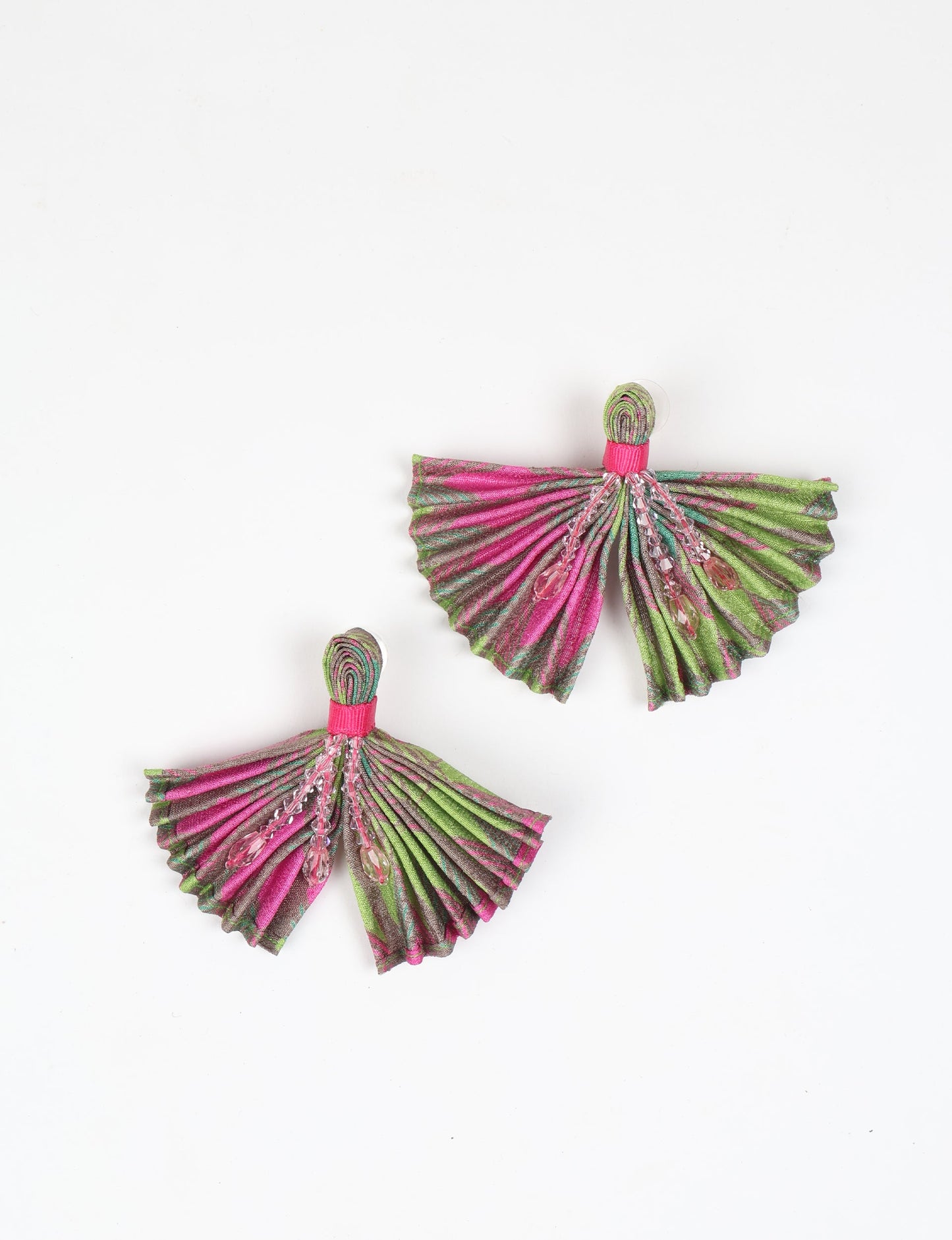 Elevate your look with our PLEATED EARRINGS – embellished with a beaded dangler, diamond-shaped metallic plate, and hook fastening. Crafted with innovative heat setting techniques on pre-loved saris, these earrings showcase ethical clothing, green fashion, and zero waste fashion. Hypoallergy tested metal hooks, nickel, and lead-free for a conscious and stylish accessory.